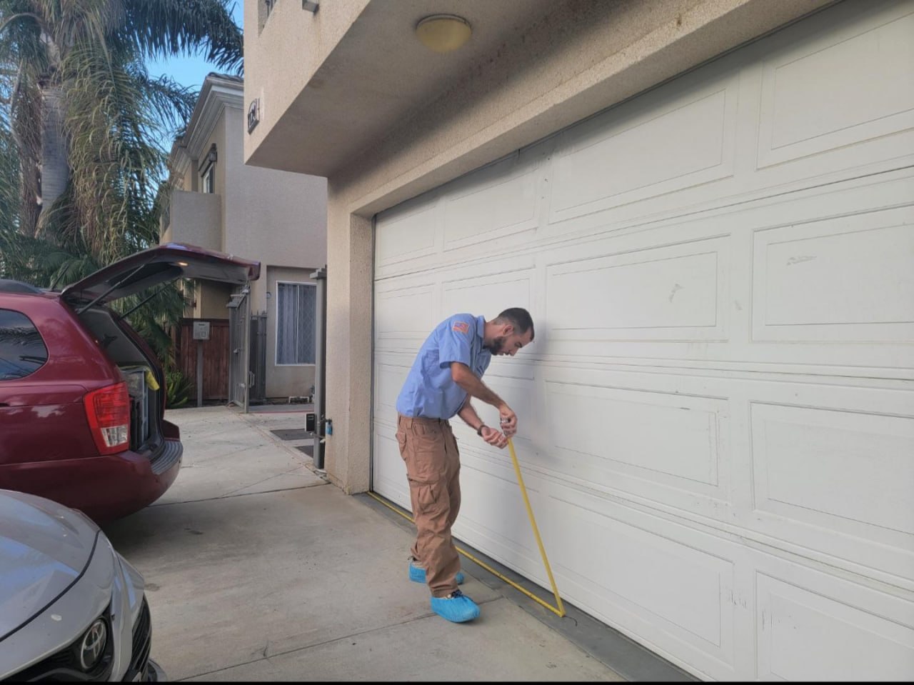 Quick Fix Garage Door Repair team and service van in Long Beach